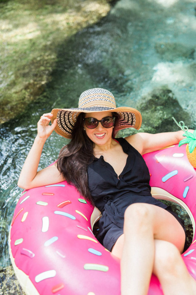 model in donut float straw hat sunglasses kelly park rock springs
