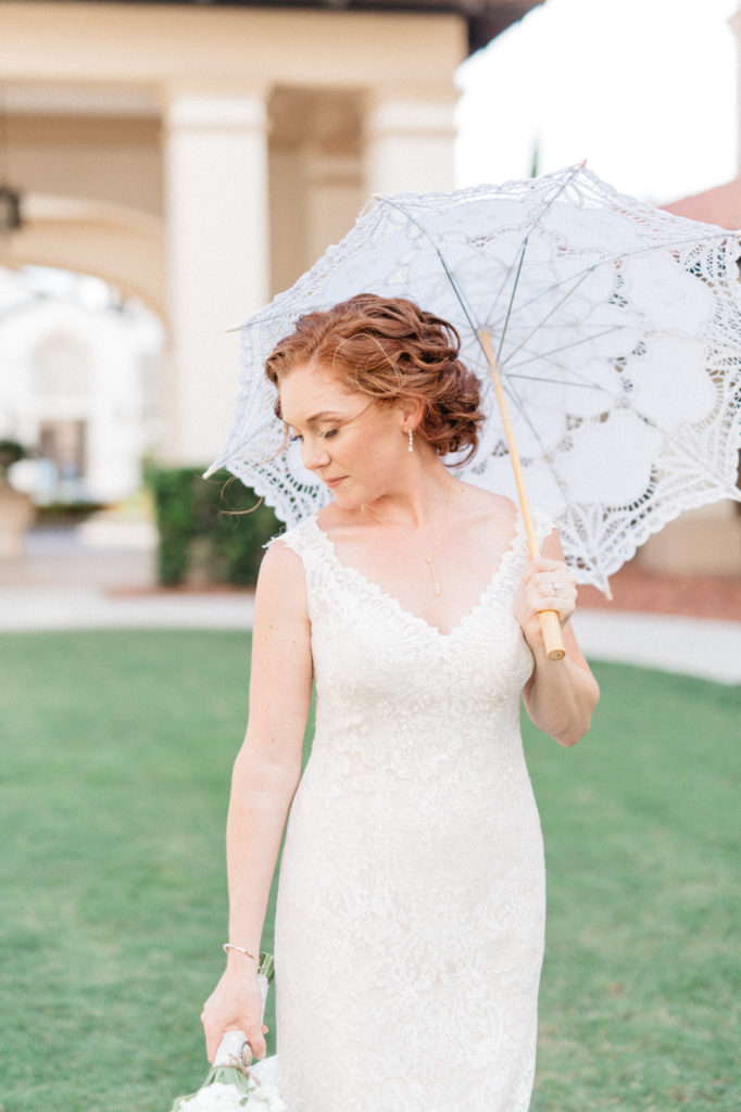 bride with lace umbrella