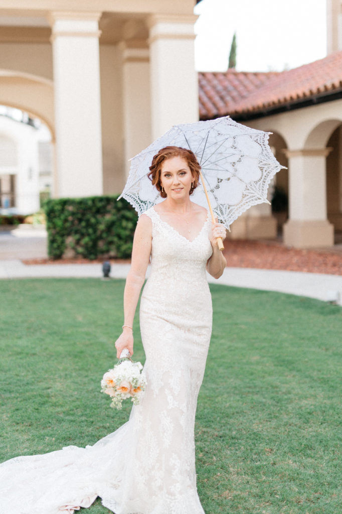 bride with parasol at alfond inn