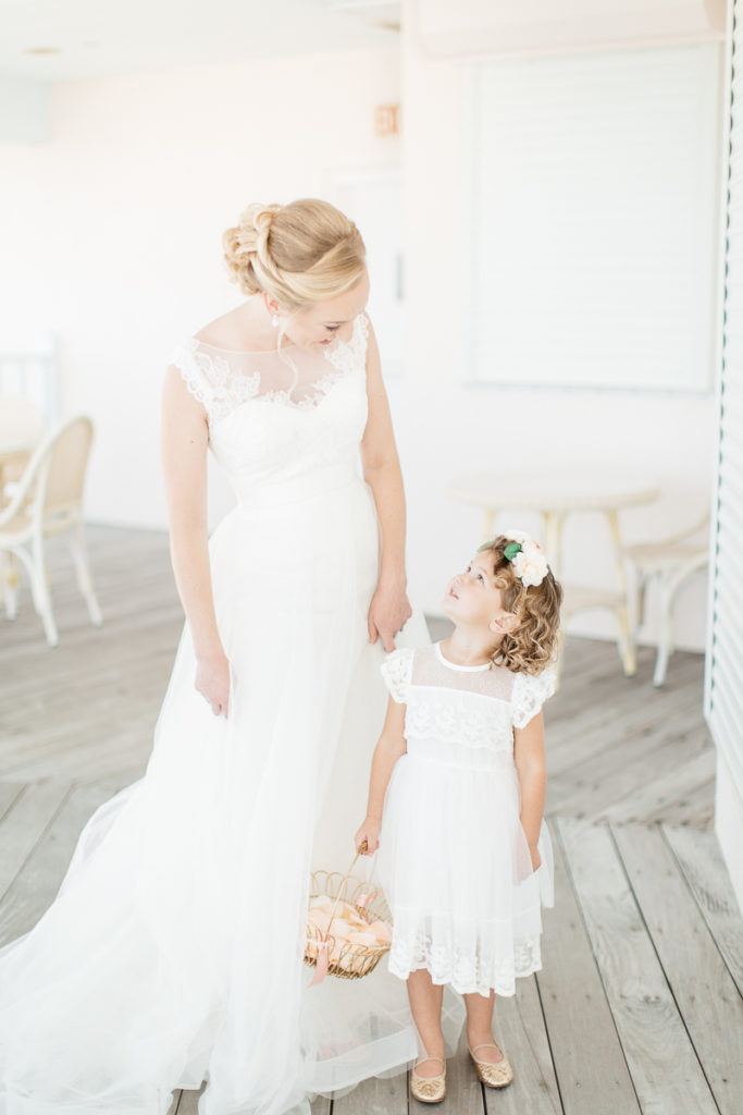 bride and young flower girl at boca bay pass club wedding