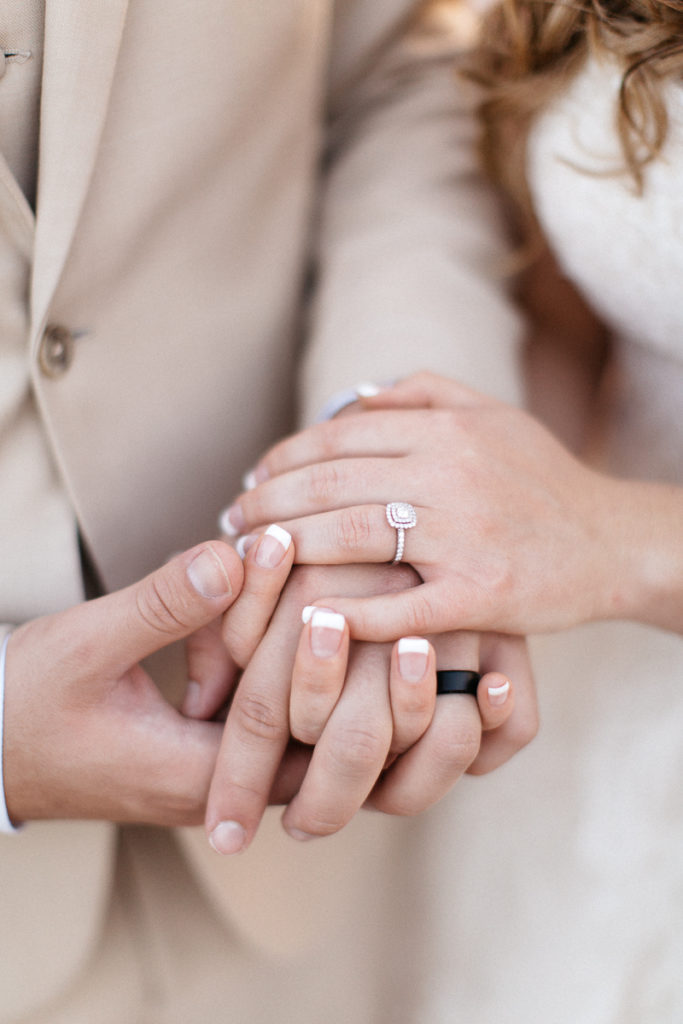 bride and groom portraits at golden bear club wedding rings