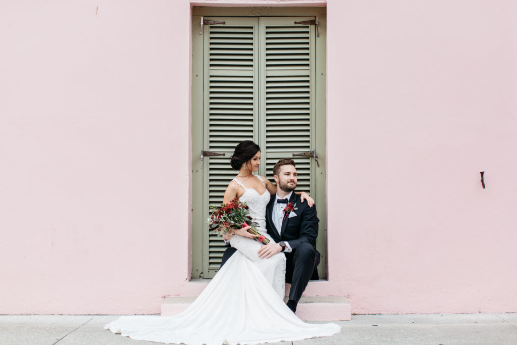 Kirsten and JC share a moment together at a beautiful pink house in historic St. Augustine wedding