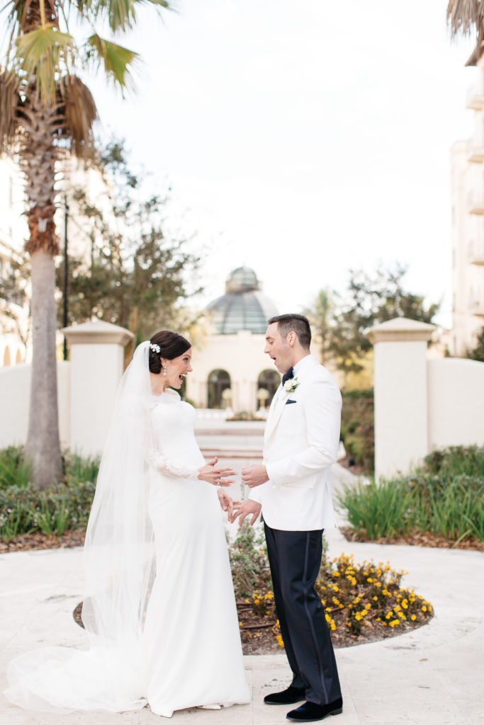 bride and groom first look at the alfond inn wedding
