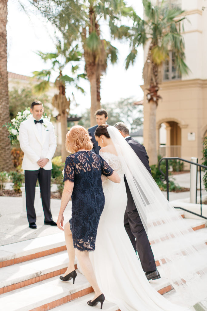 bride being escorted down the aisle at her alfond inn wedding 