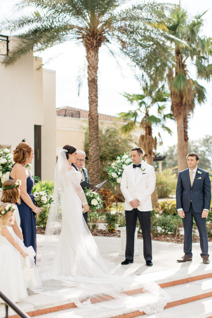 bride and groom at the ceremony of their alfond inn wedding