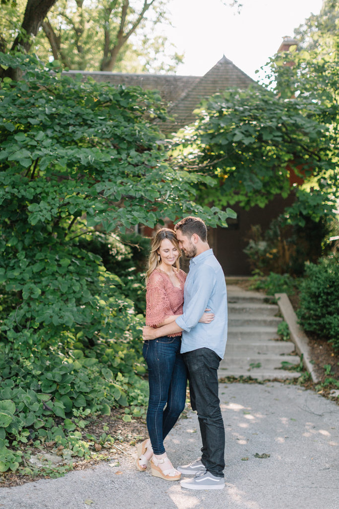 couple standing in front of steps at Nature Boardwalk at Lincoln Park Zoo