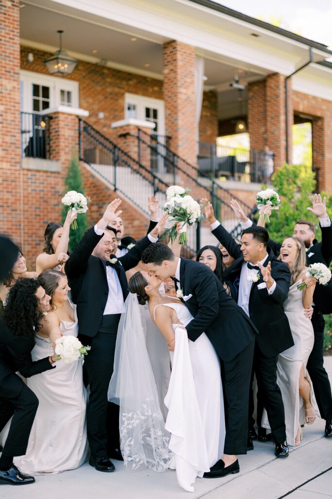 Wedding party cheers at Carmel Country Club Raleigh Wedding Day