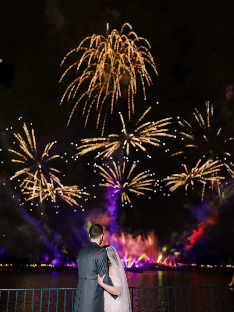 Private fireworks viewing at EPCOT’s UK Pavilion captured by Walt Disney World wedding photographer Casie Marie Photography