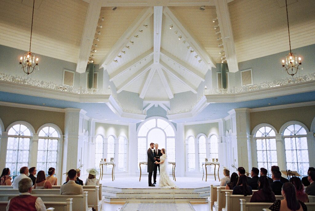 Romantic ceremony moment at Disney’s Wedding Pavilion captured by Casie Marie Photography