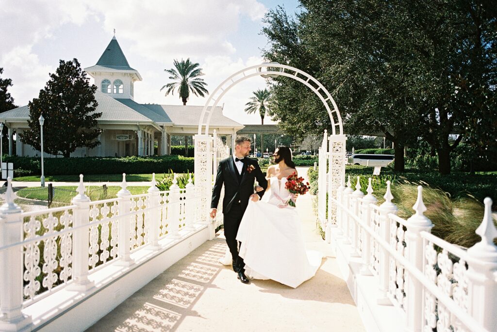 Bride and groom going to their ceremony at The Wedding Pavilion at Walt Disney World captured by Disney wedding photographer Casie Marie Photography
