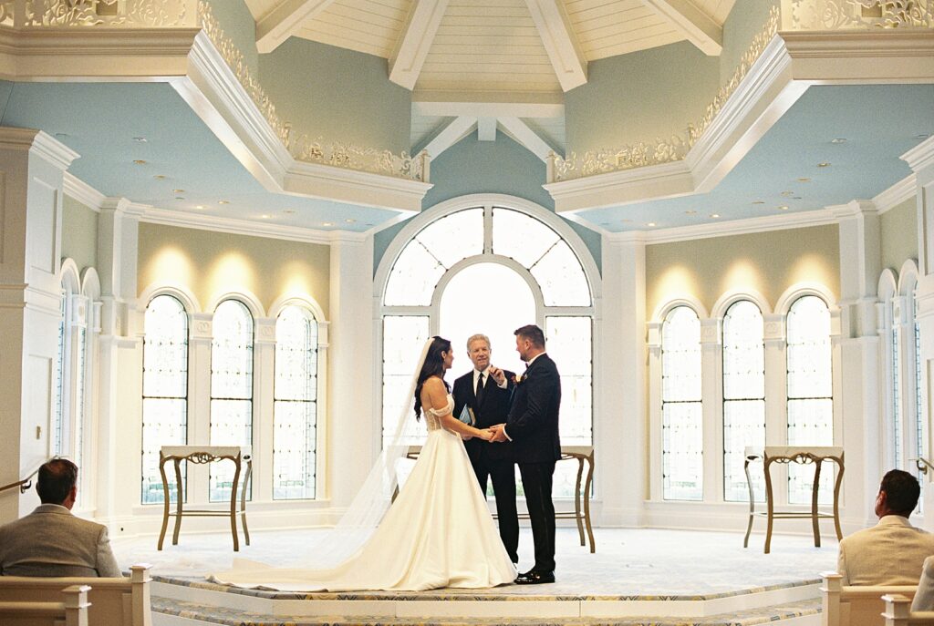 Romantic ceremony moment at Disney’s Wedding Pavilion captured by Casie Marie Photography
