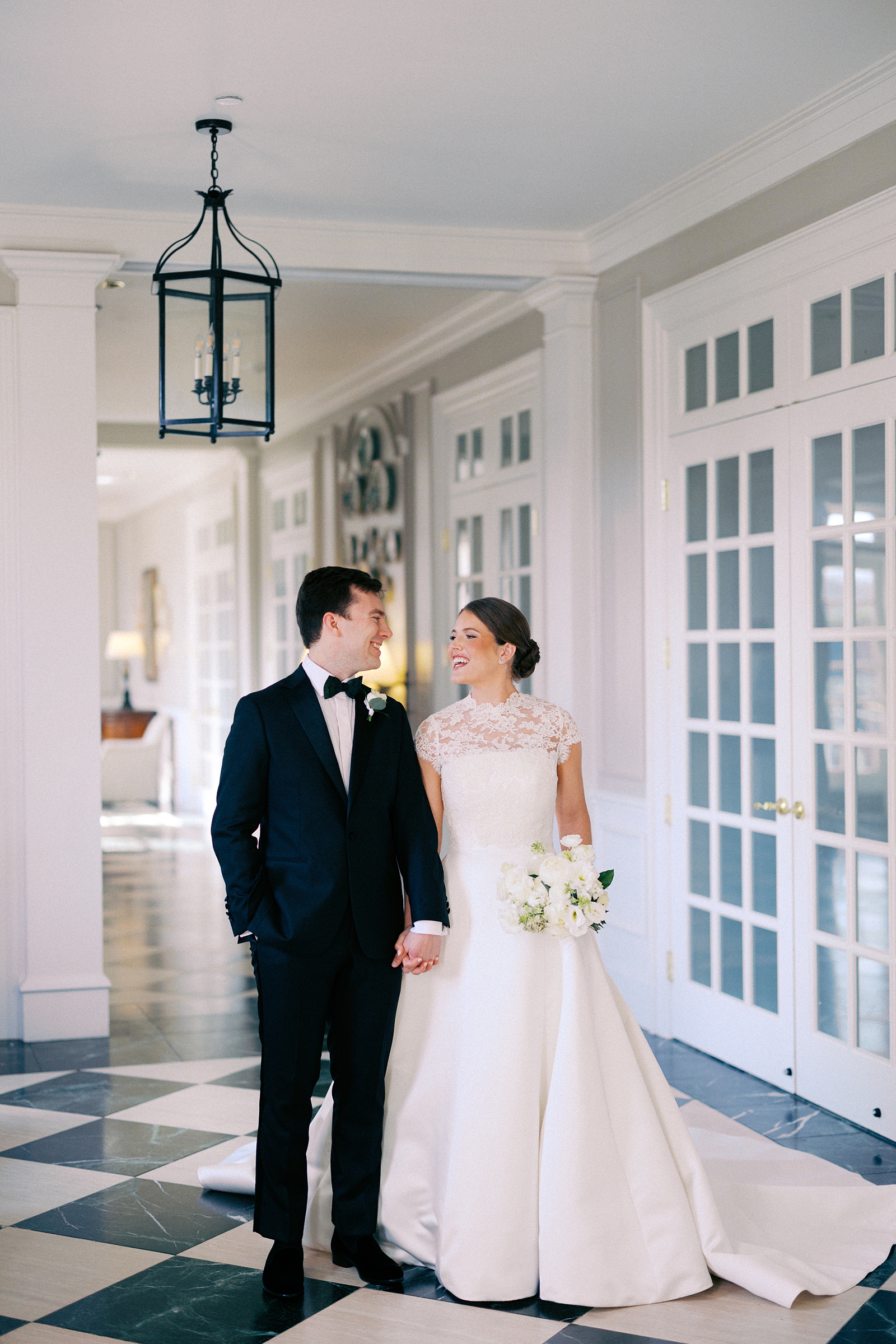 Bride and groom portraits inside the hallway at Forsyth Country Club, Photographed by Casie Marie Photography